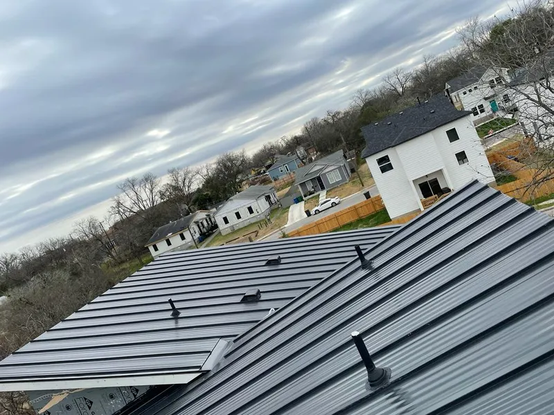Standing seam metal roof panels with vents for Skylight Repair in Idaho Falls